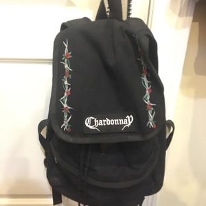 black backpack with patches